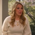 Becca’s white puff sleeve sweater on Leanne
