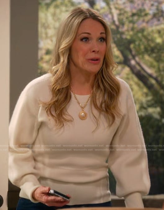 Becca's white puff sleeve sweater on Leanne