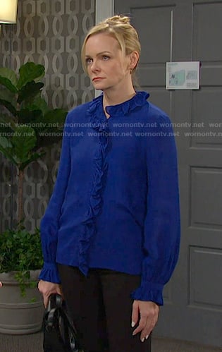 Belle's blue ruffle blouse on Days of our Lives