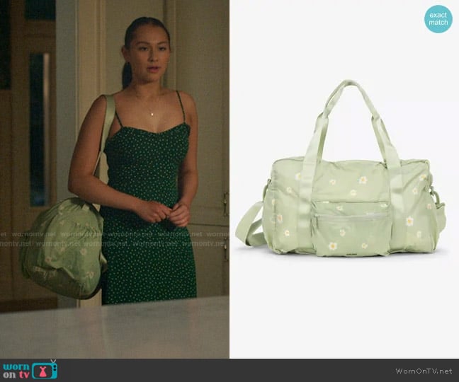 Calpak Compakt Duffel Bag in Daisy worn by Belly Conklin (Lola Tung) on The Summer I Turned Pretty