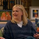 Carol’s blue v-neck sweater on Leanne