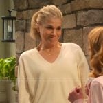 Carol’s yellow v-neck sweater and side stripe pants on Leanne