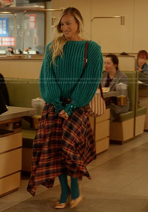 Carrie's plaid skirt and sweater on And Just Like That