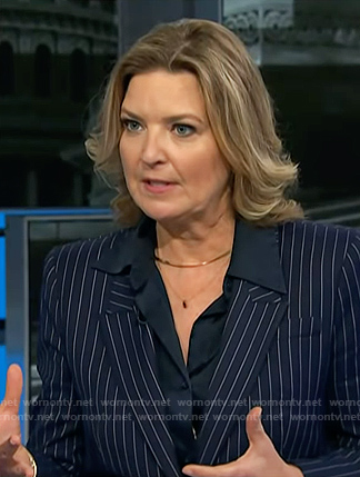 Christine Romans’ navy pinstripe blazer and skirt suit on NBC News Daily