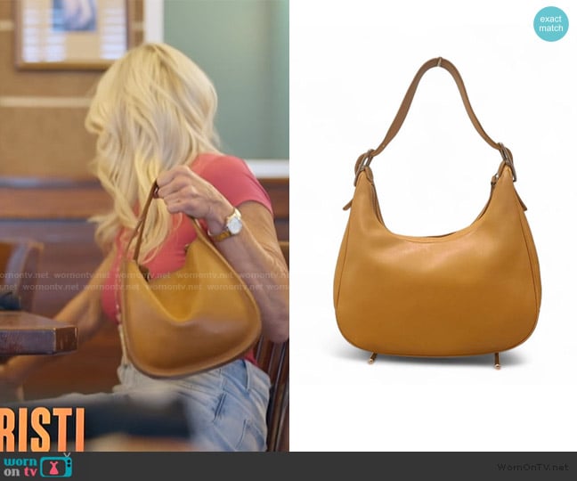 Coach Leather Shoulder bag worn by Kristi McBee on The McBee Dynasty Real American Cowboys