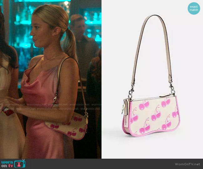 Coachtopia x The Summer I Turned Pretty Small Wavy Shoulder Bag with Cherry Print worn by Taylor Jewel (Rain Spencer) on The Summer I Turned Pretty