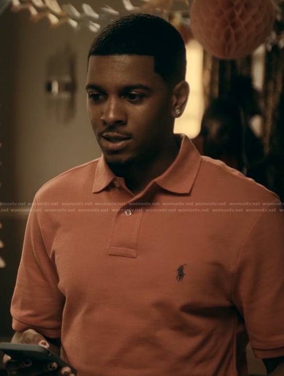 Damien's orange polo on The Chi