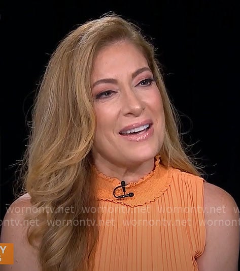 Debra Alfarone's orange pleated dress on CBS Mornings