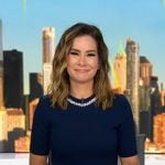 Rebecca’s navy embellished neck sweater on Good Morning America