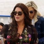 Emily’s black floral blouse on The Real Housewives of Orange County