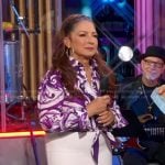 Gloria Estefan’s purple printed tie waist top on Good Morning America