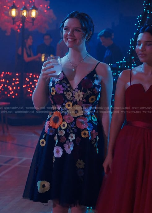 Grace’s black floral applique dress