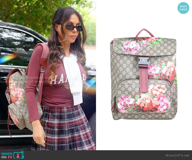 Gucci GG Supreme Blooms Drawstring Bakcpack worn by Adriana de Moura (Adriana de Moura) on The Real Housewives of Miami