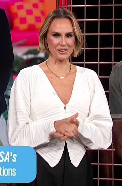 Keltie's white asymmetric cardigan on E! News