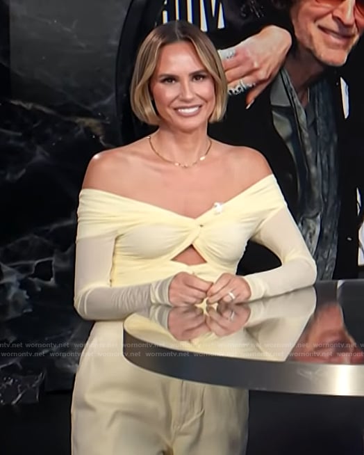 Keltie's yellow cutout mesh cutout top and pants on E! News