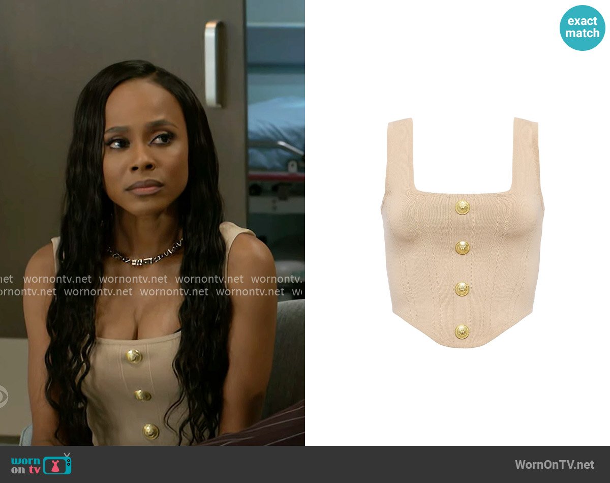 L'Agence Saga Compact-Knit Corset Top in Almond Gold worn by Hayley Lawson (Marquita Goings) on Beyond the Gates
