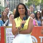 Laura’s yellow sleeveless shirt and white pleated skirt on Today