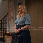 Leanne’s blue puff-sleeve top and denim midi skirt on Leanne