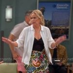 Leanne’s white linen shirt and printed skirt on Leanne