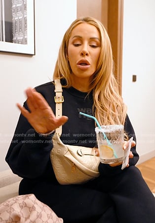 Lisa's black sweatshirt and bag on The Real Housewives of Miami