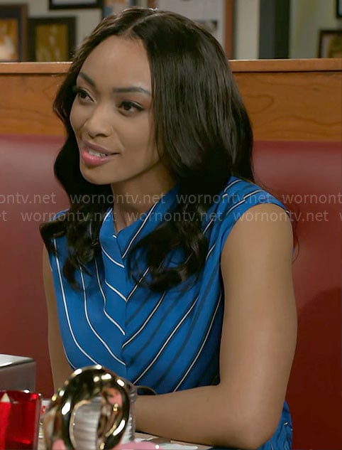 Madison's blue striped top on Beyond the Gates