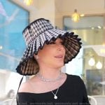 Marysol’s houndstooth pleated hat on The Real Housewives of Miami