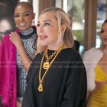 Marysol’s black feather cuff sweater on The Real Housewives of Miami