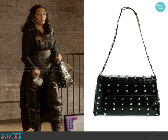 McQueen Large Slouch Studded Leather Bag worn by Seema Patel (Sarita Choudhury) on And Just Like That