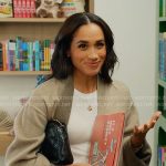 Meghan’s beige wrap coat on With Love Meghan