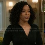 Naomi’s black rib knit polo top and side-stripe pants on Beyond the Gates