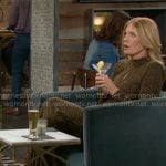 Phyllis’s gold front keyhole cutout dress on The Young and the Restless