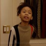 Gabrielle’s plaid sweater and mini skirt on And Just Like That