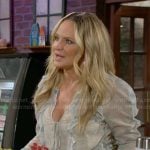 Sharon’s floral ruffled blouse on The Young and the Restless
