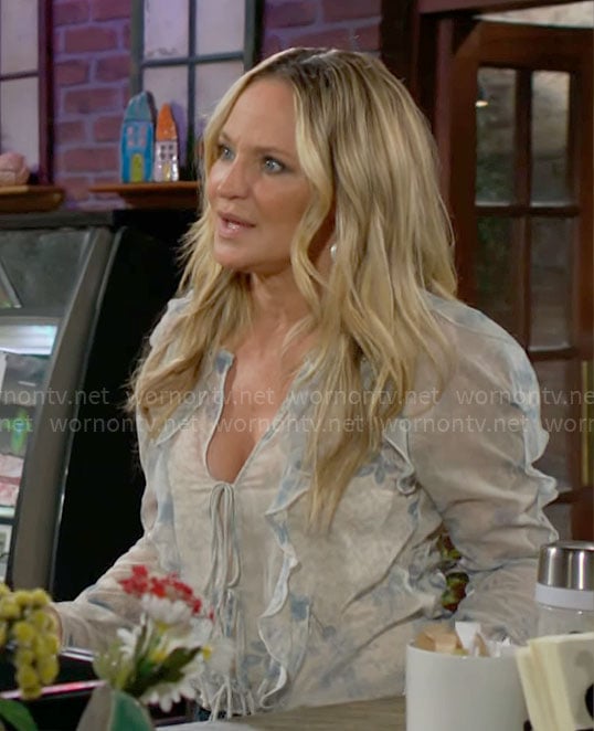 Sharon’s floral ruffled blouse on The Young and the Restless