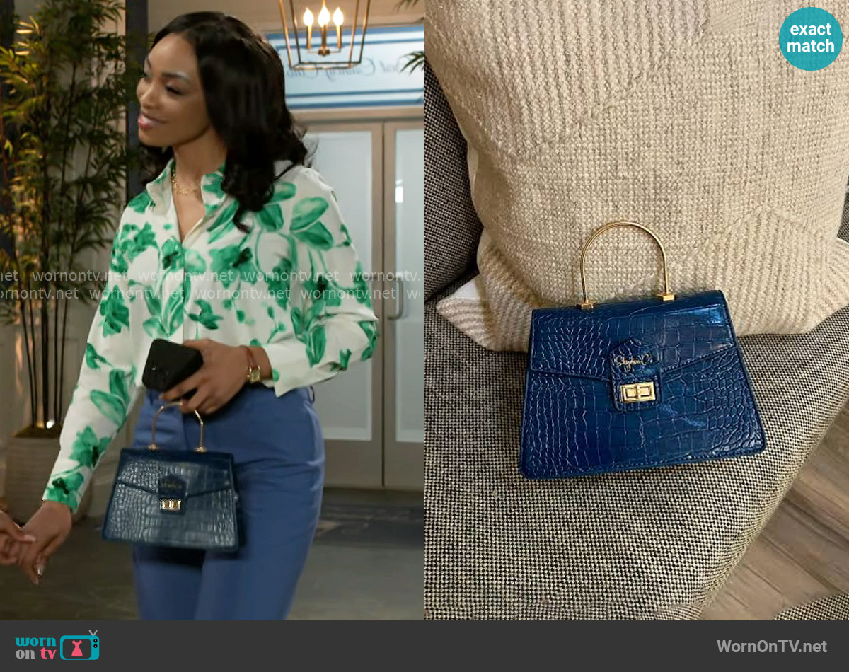 Shydiva Tracee Bag worn by Madison Montgomery (Kenjah) on Beyond the Gates