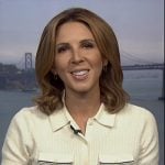 MacKenzie Sigalos’s ivory stripe short sleeve cardigan on NBC News Daily