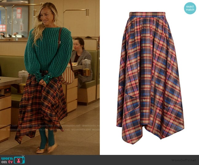 Ulla Johnson Red Annette Plaid Asymmetric Midi Skirt worn by Carrie Bradshaw (Sarah Jessica Parker) on And Just Like That