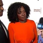 Viola Davis’s orange twist front maxi dress on E! News