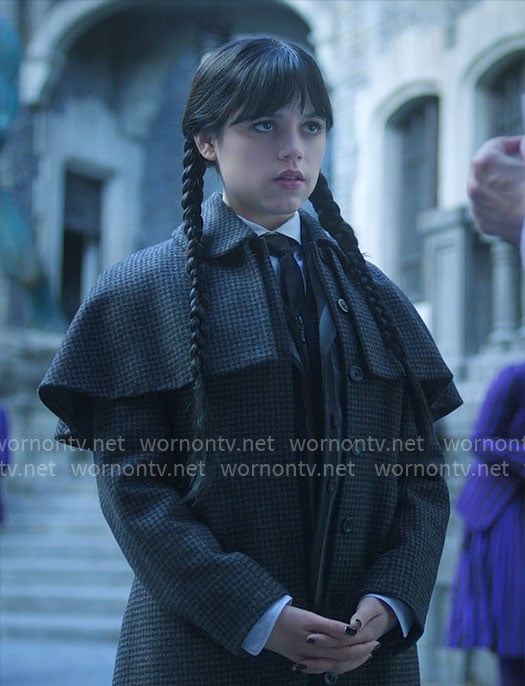 Wednesday's grey houndstooth coat on Wednesday