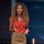 Zuri’s red floral print top and denim mini skirt on Access Hollywood