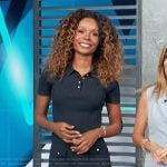 Zuri’s navy polo and mini skirt on Access Hollywood