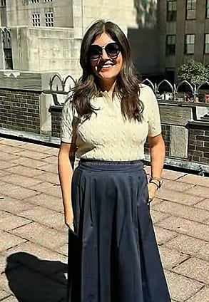 Adrianna’s white cable knit polo sweater on Today
