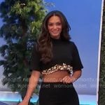 Alexis’s black and gold trim crop top and skirt set on The Price is Right