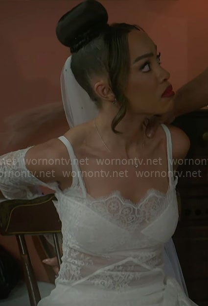 Allison’s white lace off-shoulder gown on Beyond the Gates