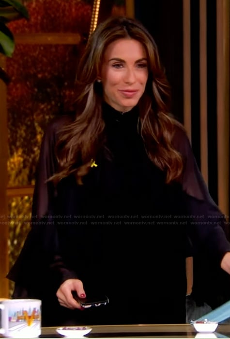 Alyssa’s black ruffle mini dress on The View