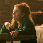 Amanda’s green scalloped cardigan and mini skirt on The Runarounds