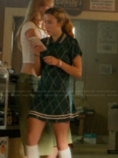 Amanda's green check shirt and skirt on The Runarounds