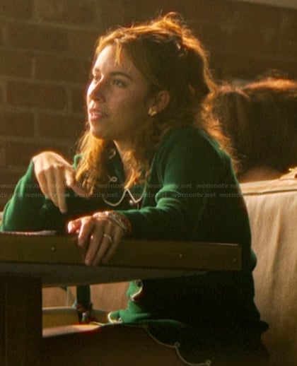Amanda's green scalloped cardigan and mini skirt on The Runarounds