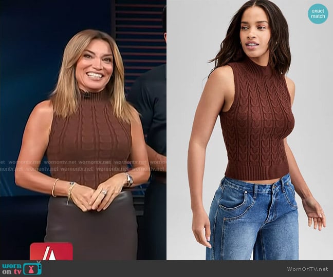 And Now This Mock-Neck Cable-Knit Sweater Tank Top in Canyon Earth worn by Kit Hoover on Access Hollywood