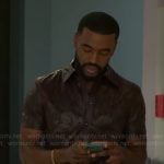 Andre’s brown leather shirt with cutouts on Beyond the Gates